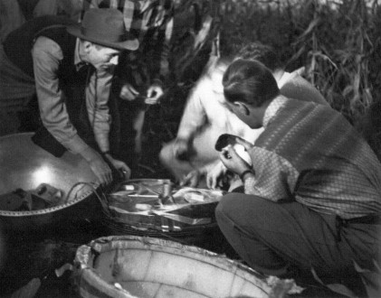 Mr. Otto Winzen taking a close view of one of the mice just recovered. Credit: Winzen Research Inc.
