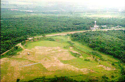 View in the foreground of the launch area. In the background, can be seen IPMET's main building and the integration building